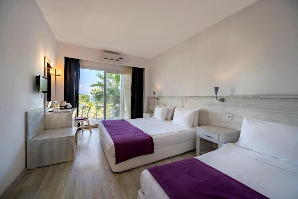 Отель Charm Beach Hotel 4*