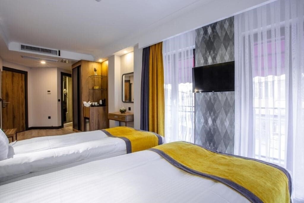 Фото Kayhan City Hotel 4*