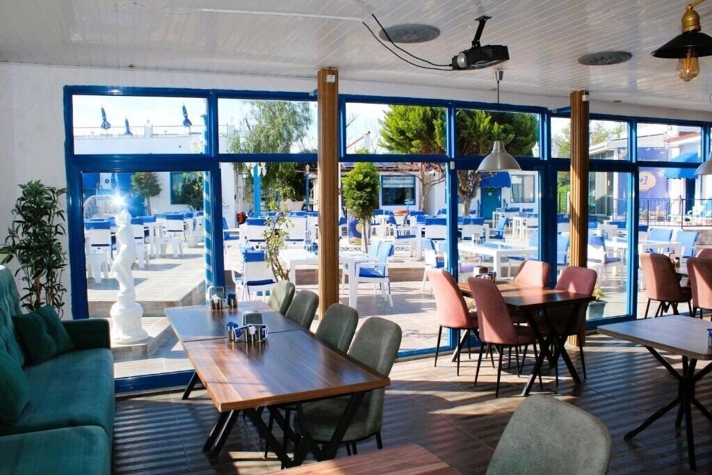 Фото Mavi Pansiyon & Restaurant 4*
