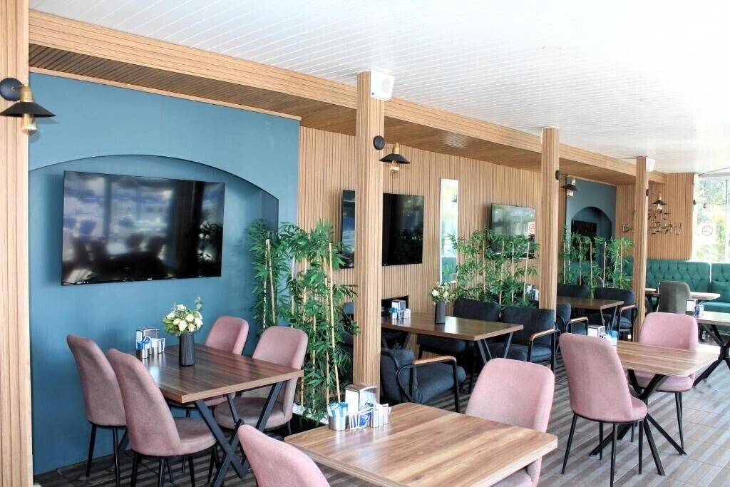 Фотографія Mavi Pansiyon & Restaurant (ex. Mavi Kitchen & Bar) 4*