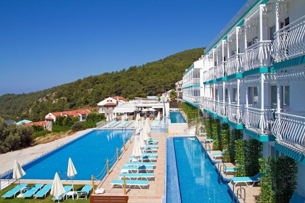 Картинка Sertil Deluxe Hotel & SPA (ex. Tropical Suites by Sertil, Ramada by Wyndham Fethiye Oludeniz) 4*