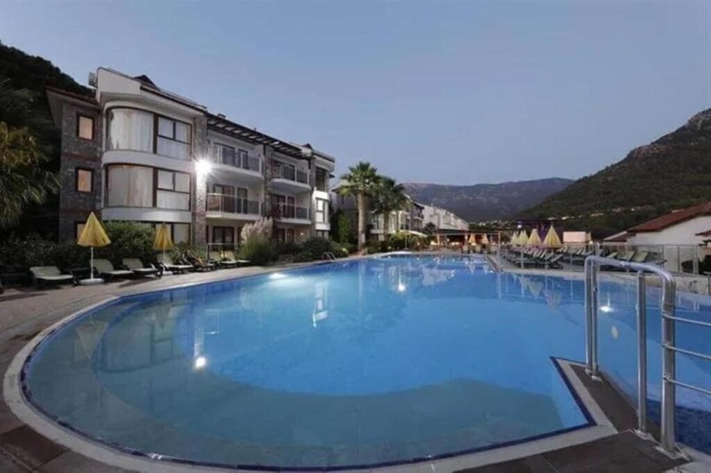 Фото Azure Palm Suites 4*