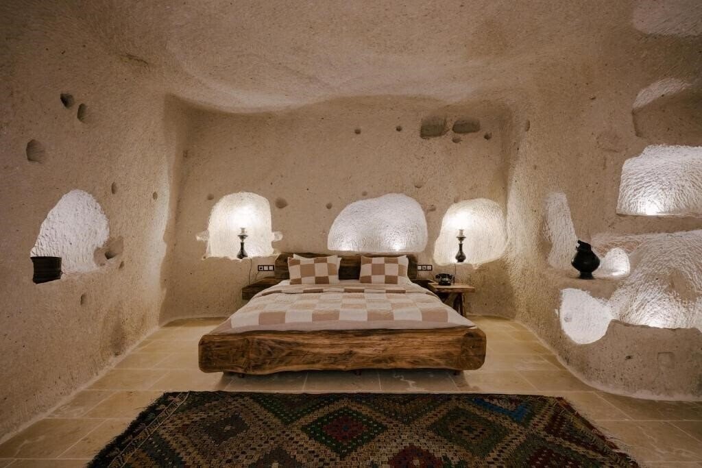 Фото Cappadocia Cave Suites 4*