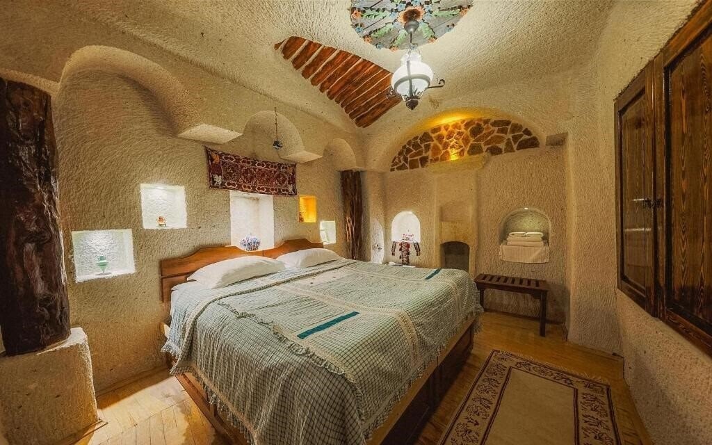 Фотографія Cappadocia Cave Suites 4*