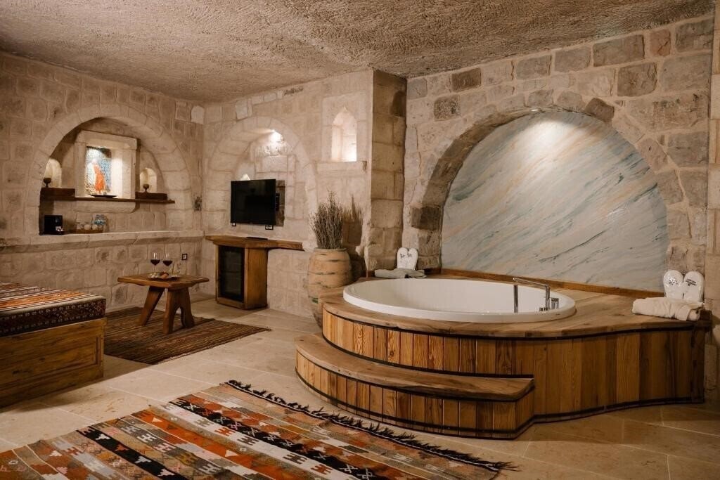 Фотографія Cappadocia Cave Suites 4*