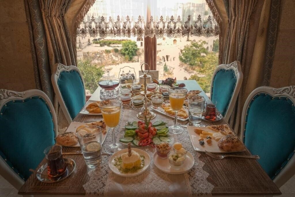 Фото Elika Cave Suites 5*