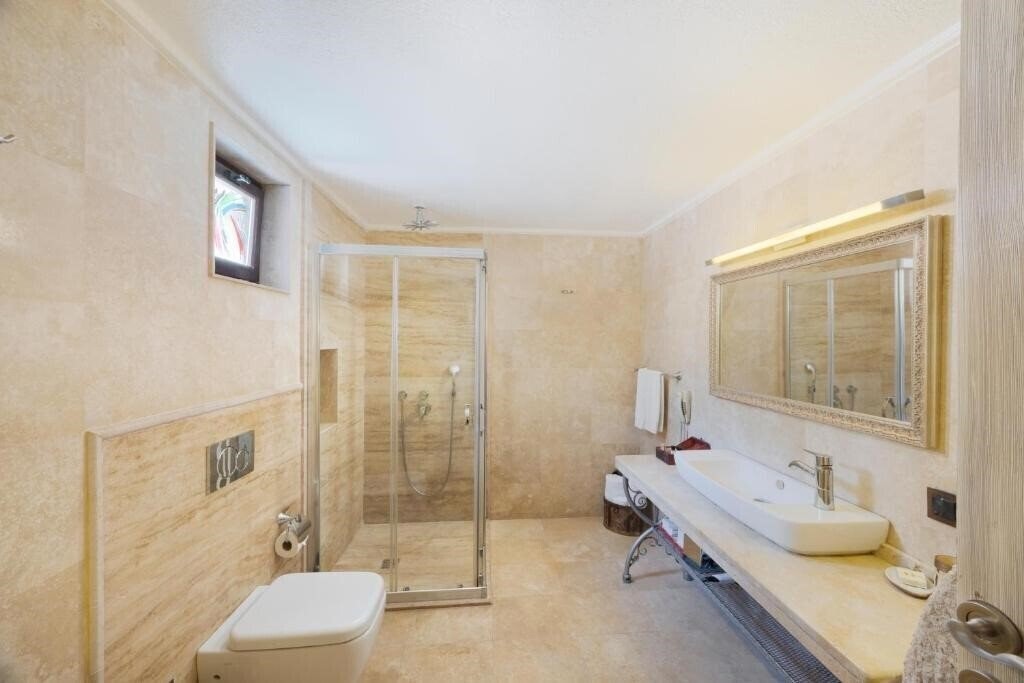 Фотографія Tafoni Houses Cave Hotel 5*