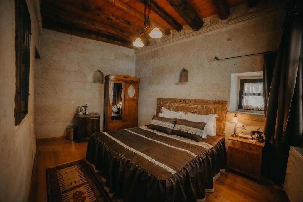 Фотографія Dere Suites Cappadocia 4*