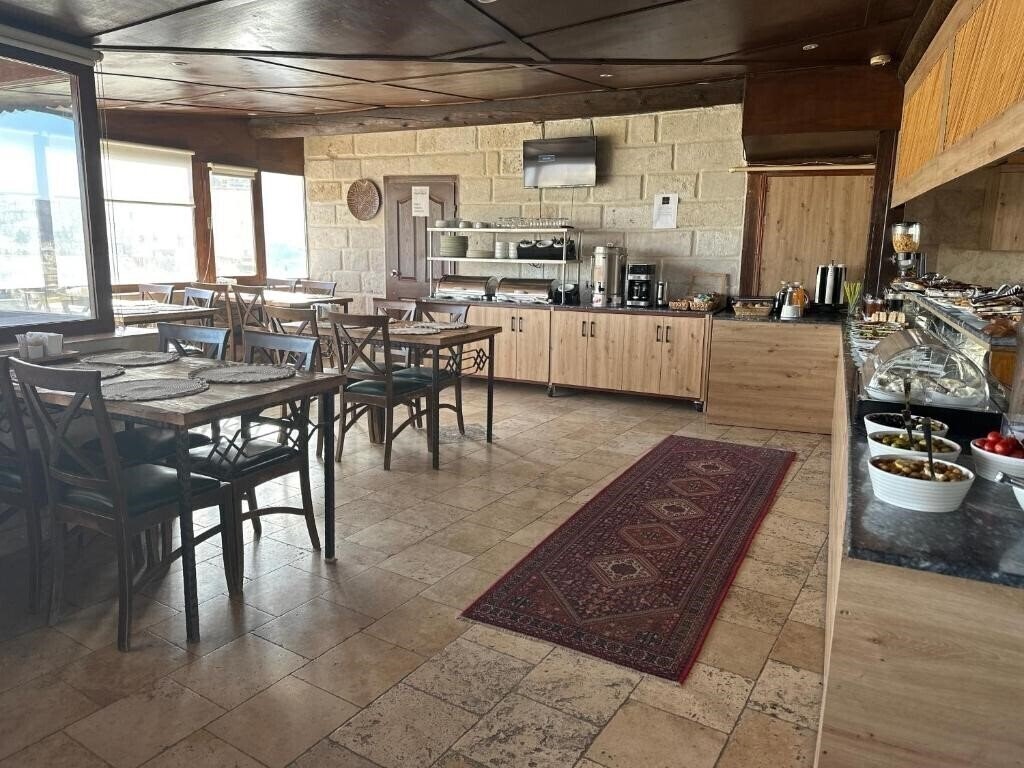 Фотография Bedrock Cave Hotel -Adults Only 3*