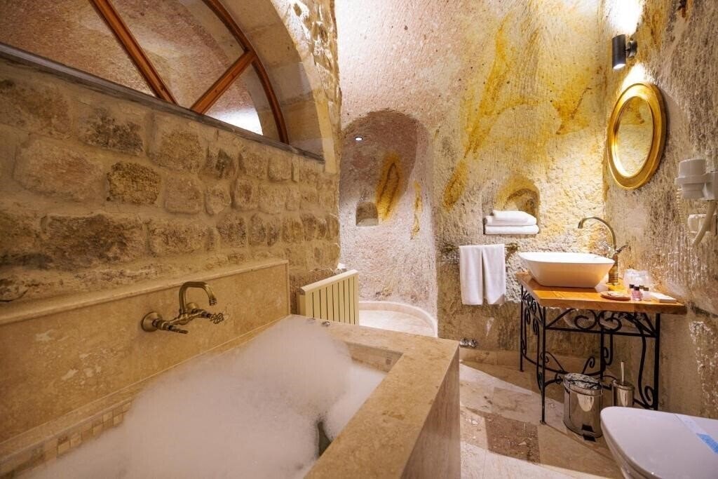Фотографія Canyon Cave Hotel (ex. Courtyard Cave Hotel) 3*