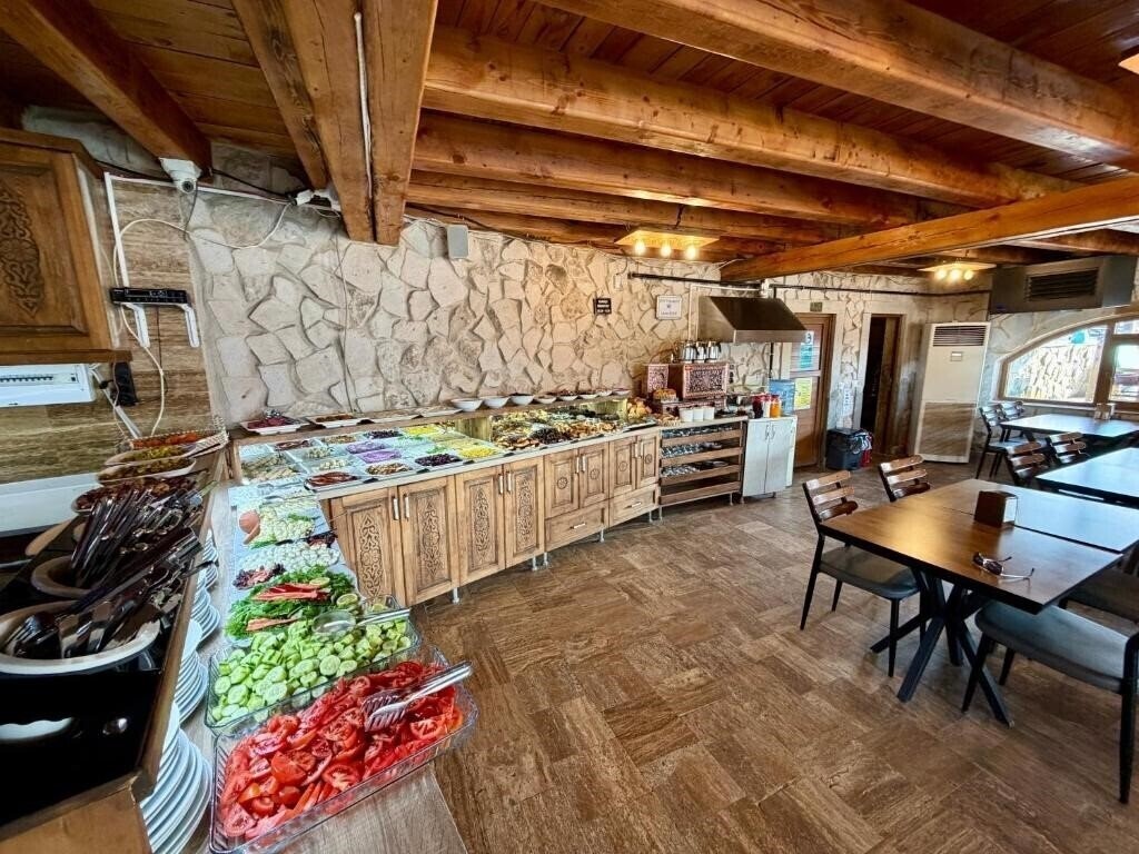 Фото Cappadocia Caves Hotel 3*