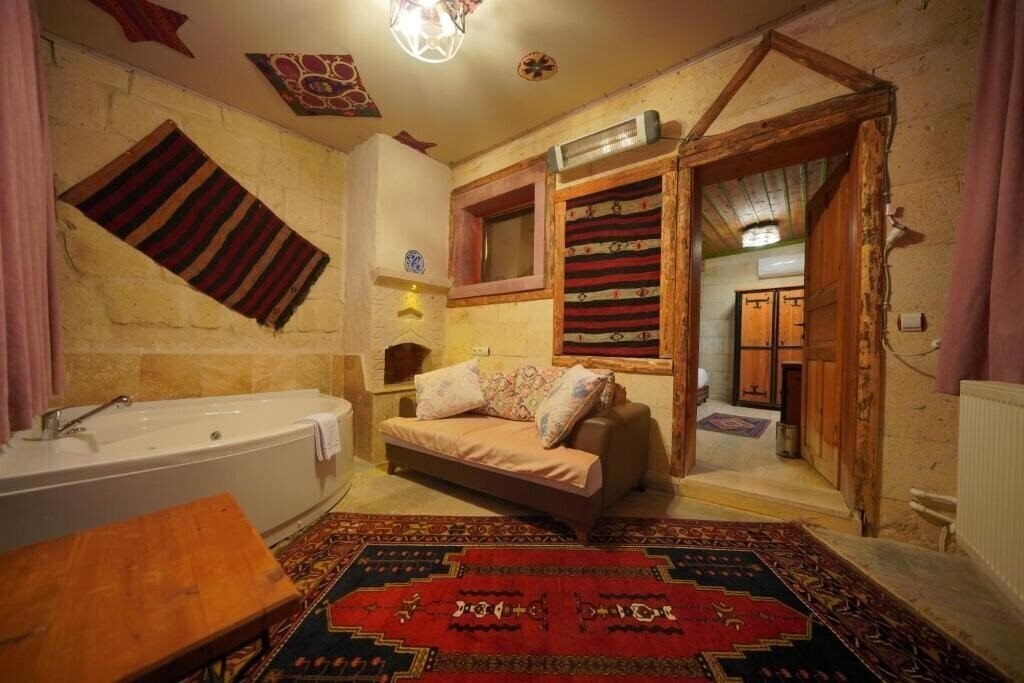 Фотографія Fosil Cave Hotel 4*