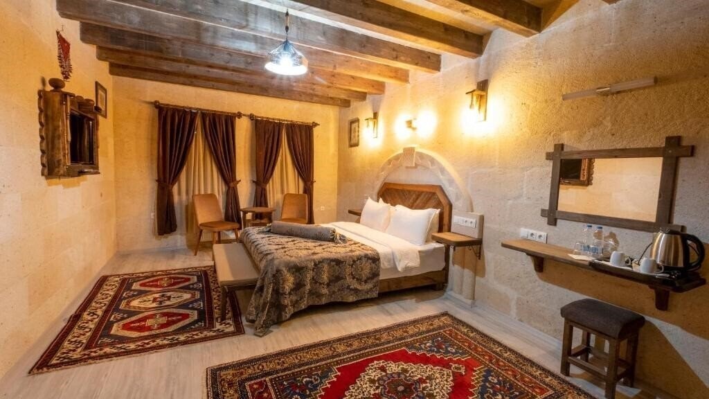 Фото In Stone House 3*