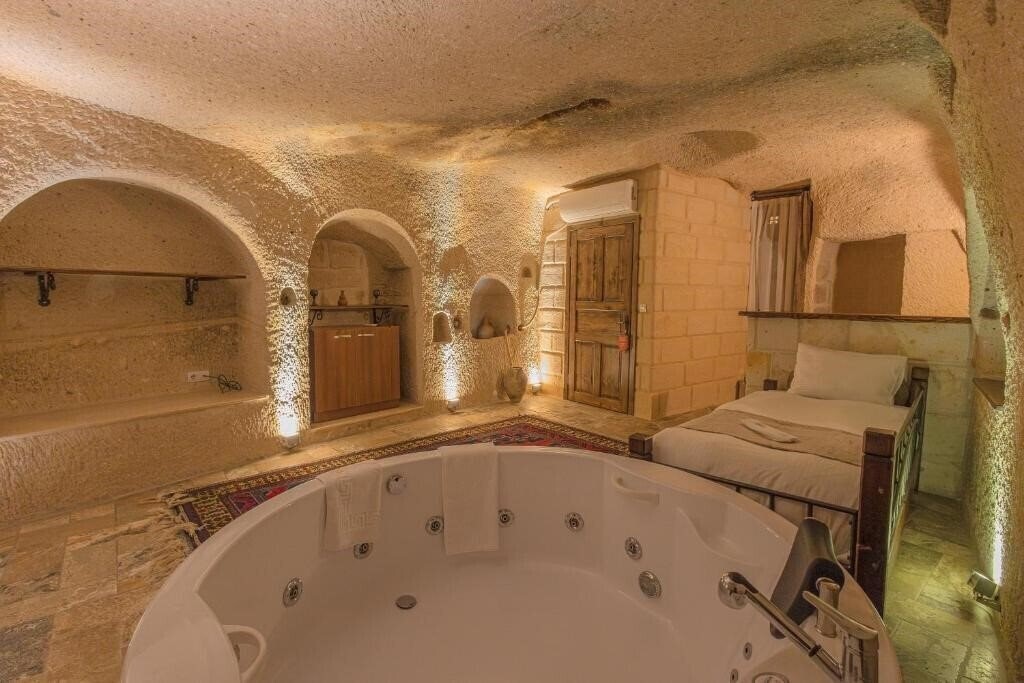 Фотографія Osmanbey Cave House Goreme 4*