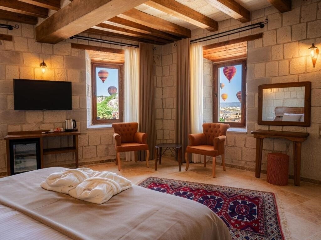 Фотографія Tulip Cave Suites 3*
