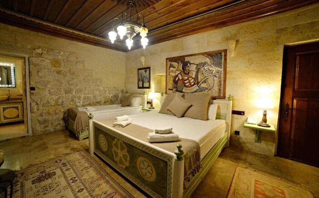 Фотографія Caftan Cave Suites 4*