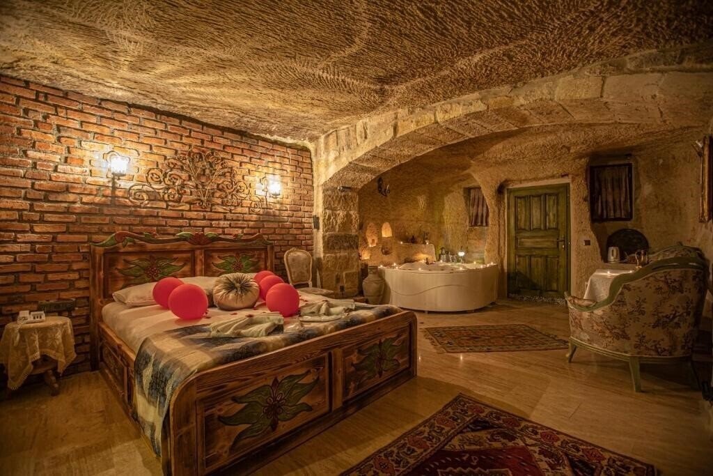 Фотографія Casia Cave Suites 4*
