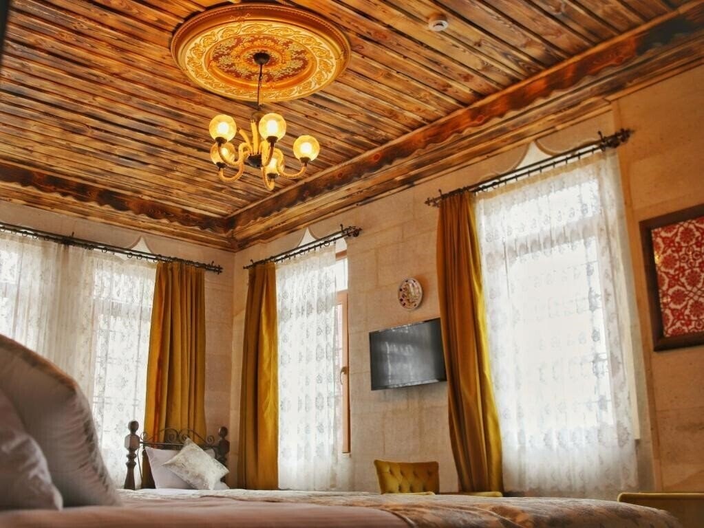Фото Caravanserai Inn Hotel 3*