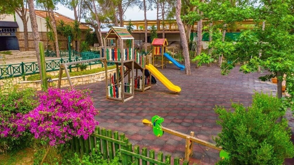 Фотографія Champion Holiday Village 5*