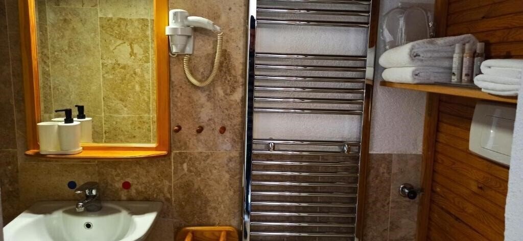 Фотографія Swiss Eviniz Hotel 2*