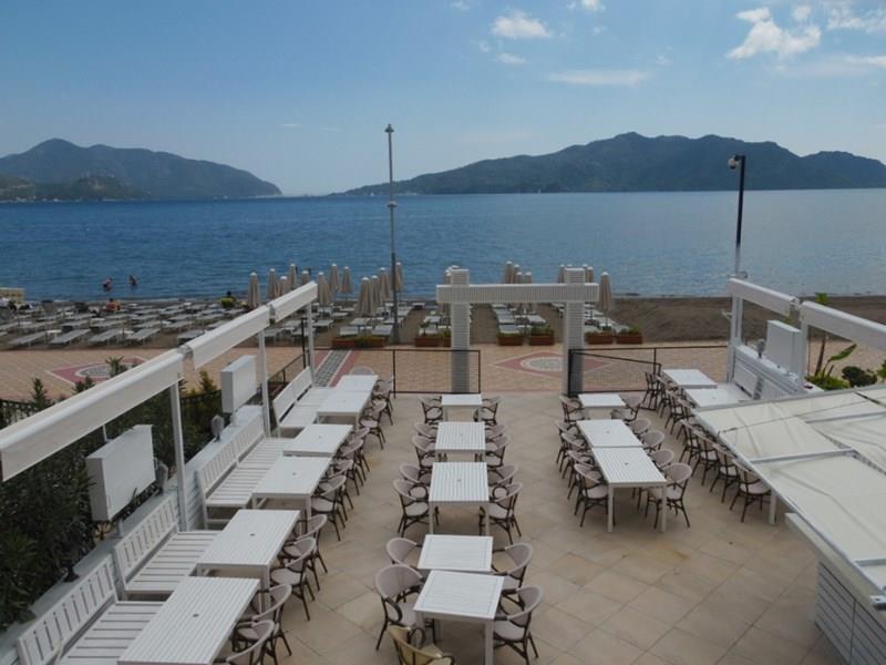 Фотографія Cle Beach Boutique Hotel 4*