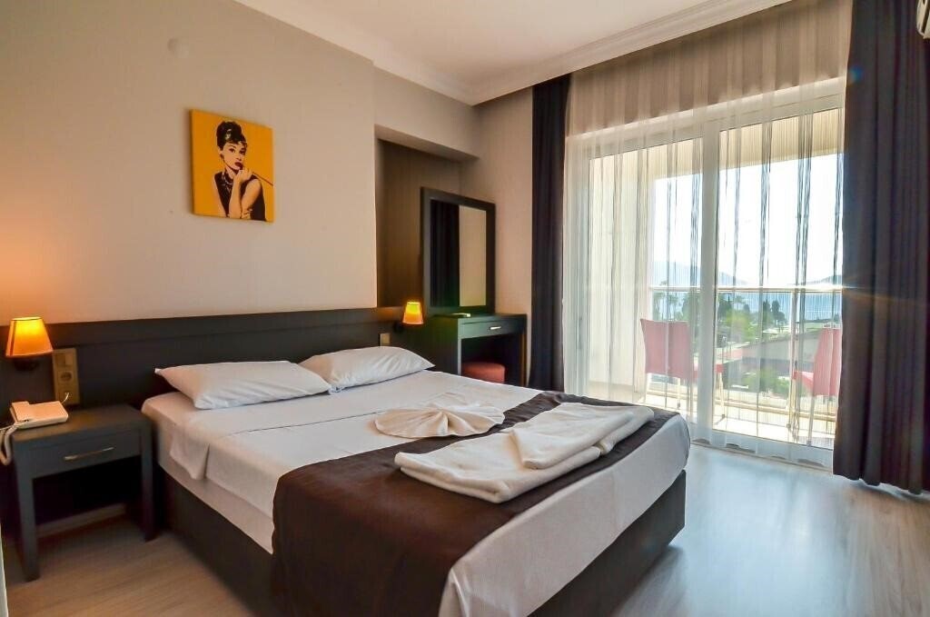 Фото Berry Bella Hotel 3*