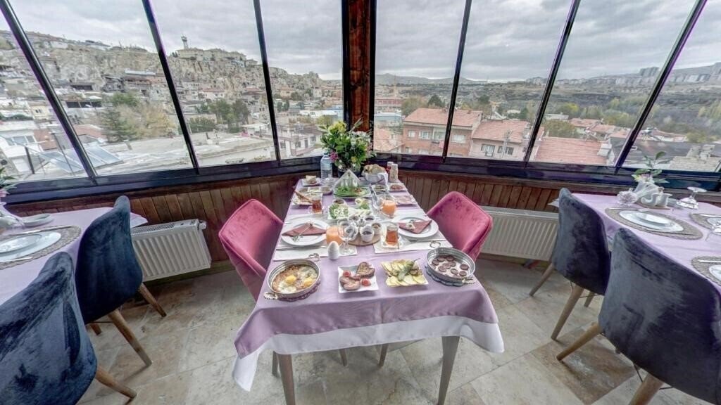 Фото Cappadocia Alaz Cave Otel 3*