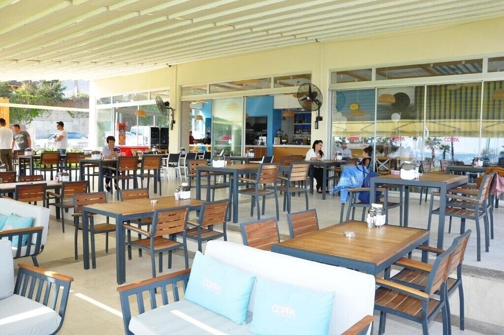 Фото Cinar Family Suite Hotel (ex. Cinar Garden Apart Hotel) 3*