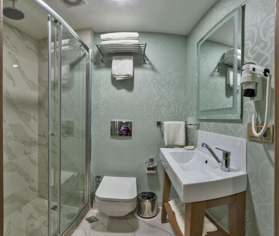Фотографія Taximist Hotel 3*