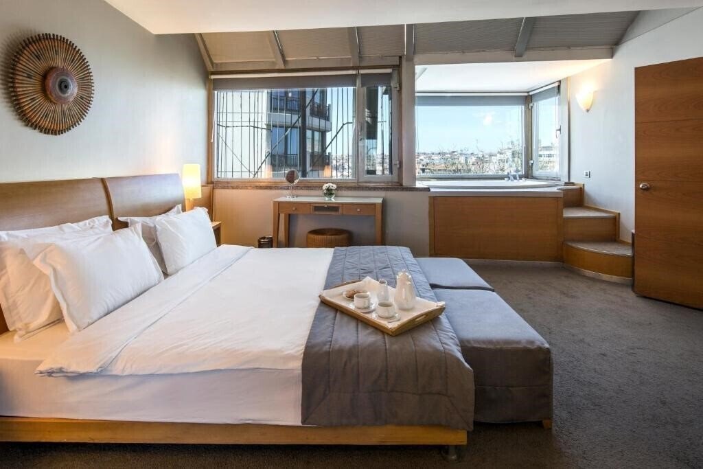 Фото Taxim Suites Residences Istanbul 4*