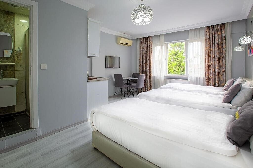 Фото Unique Suite 3*