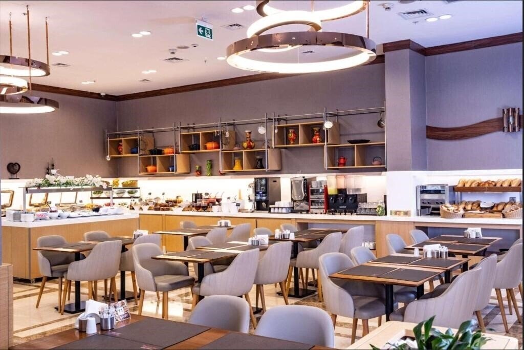 Фотографія Ramada By Wyndham Istanbul Alibeykoy 4*