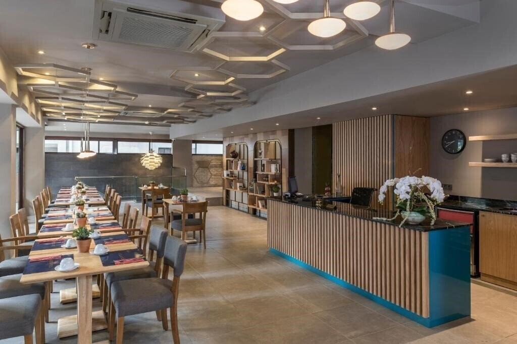 Фотографія Upsuites Hotel 4*