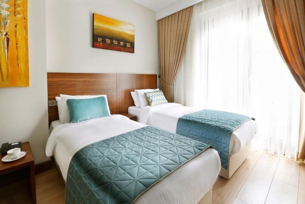 Зображення The White Orient Hotel 4*