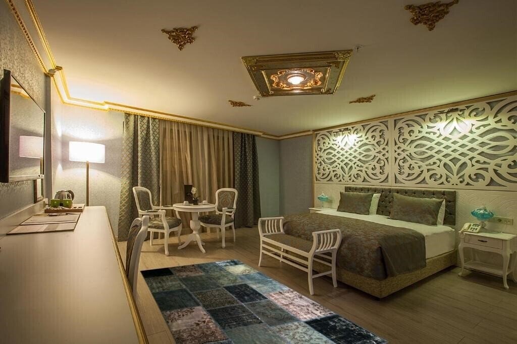 Фото Empire Suite Hotel 4*