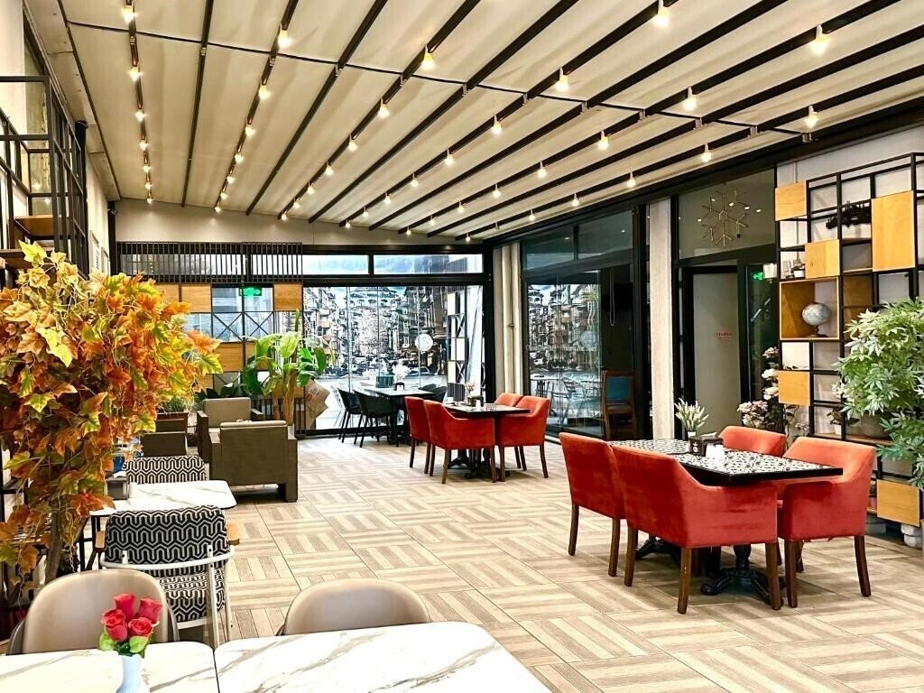 Фотографія Niconya Port Suites & Hotel 3*