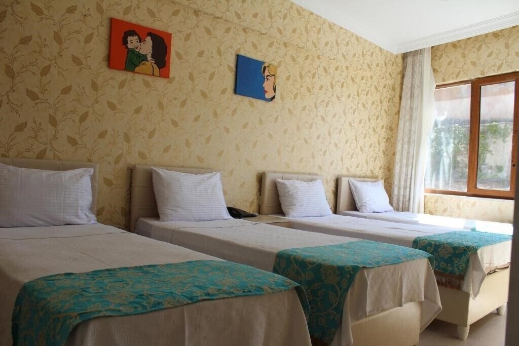 Фото Omega Inn Hotel 3*
