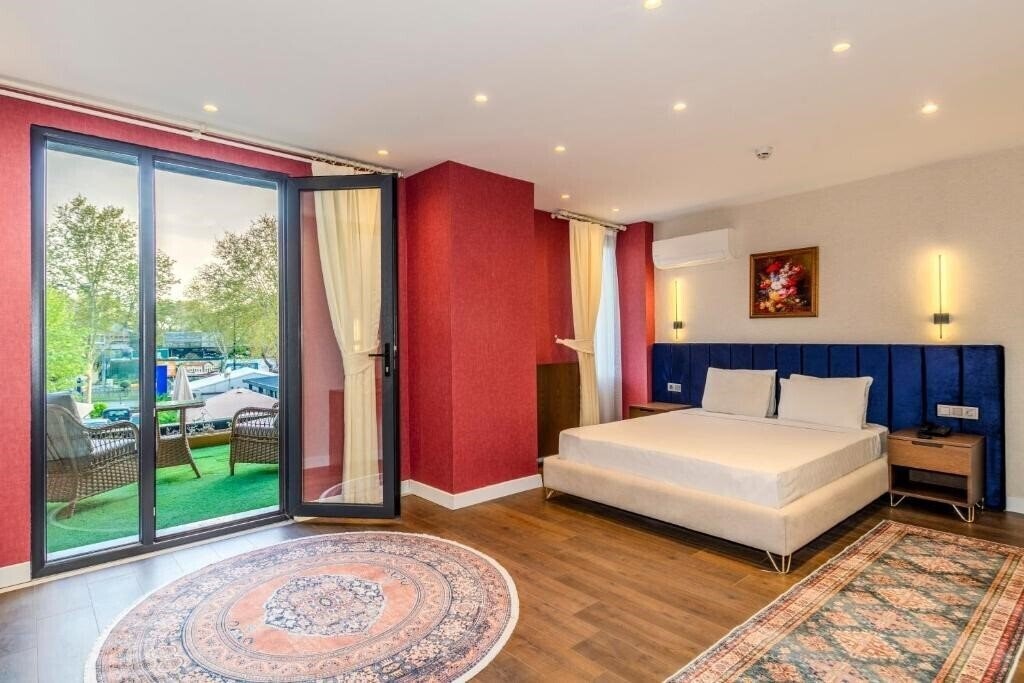 Отель Porta Romanos Hotel 4*