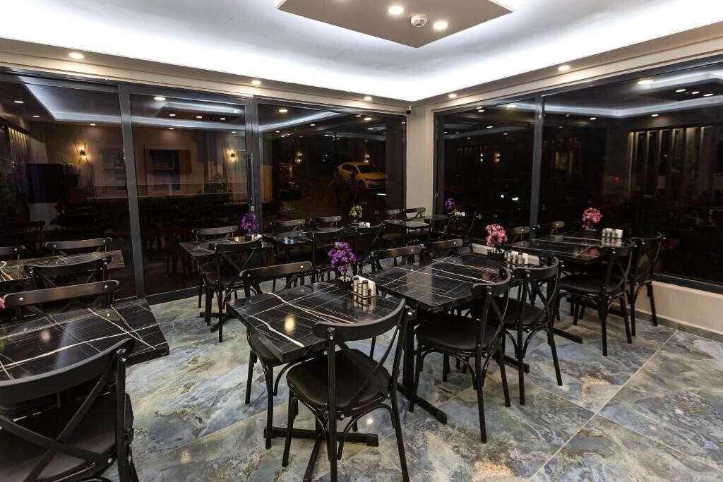 Фотографія Ria Suites 4*