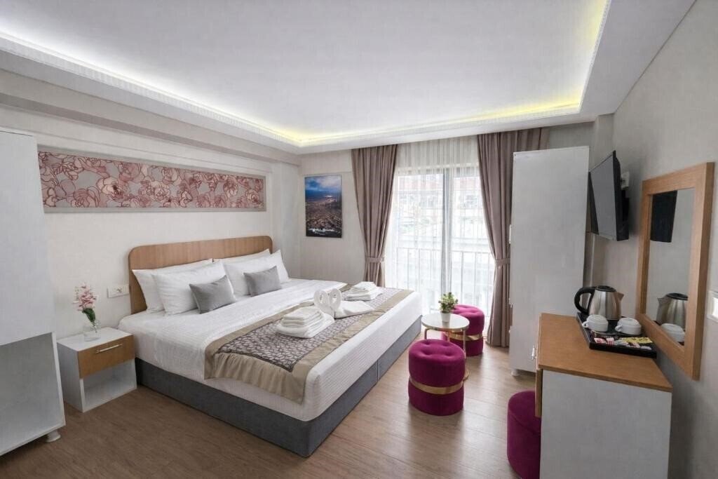 Фотография Ria Suites 4*