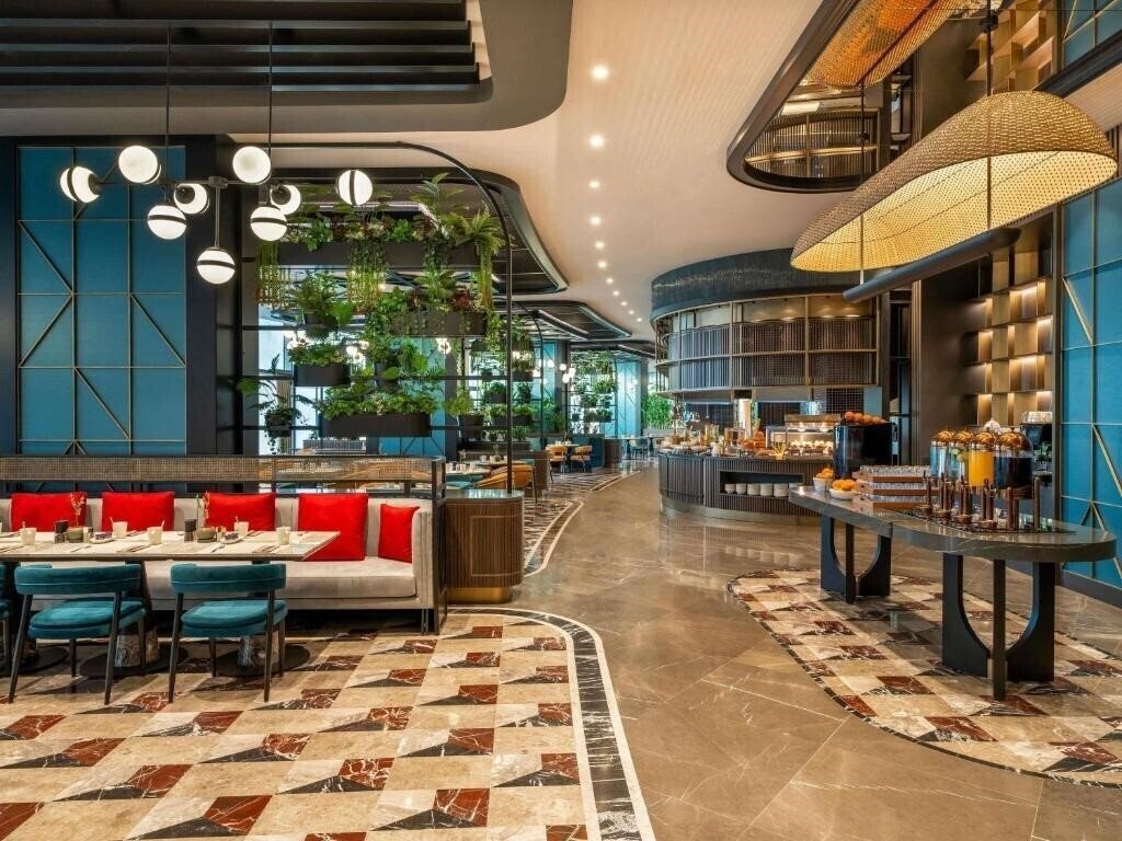 Фотография Movenpick Hotel Istanbul Marmara Sea 5*
