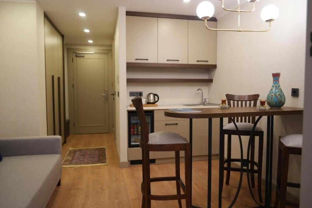 Фотографія Nevi Hotel & Suites 4*