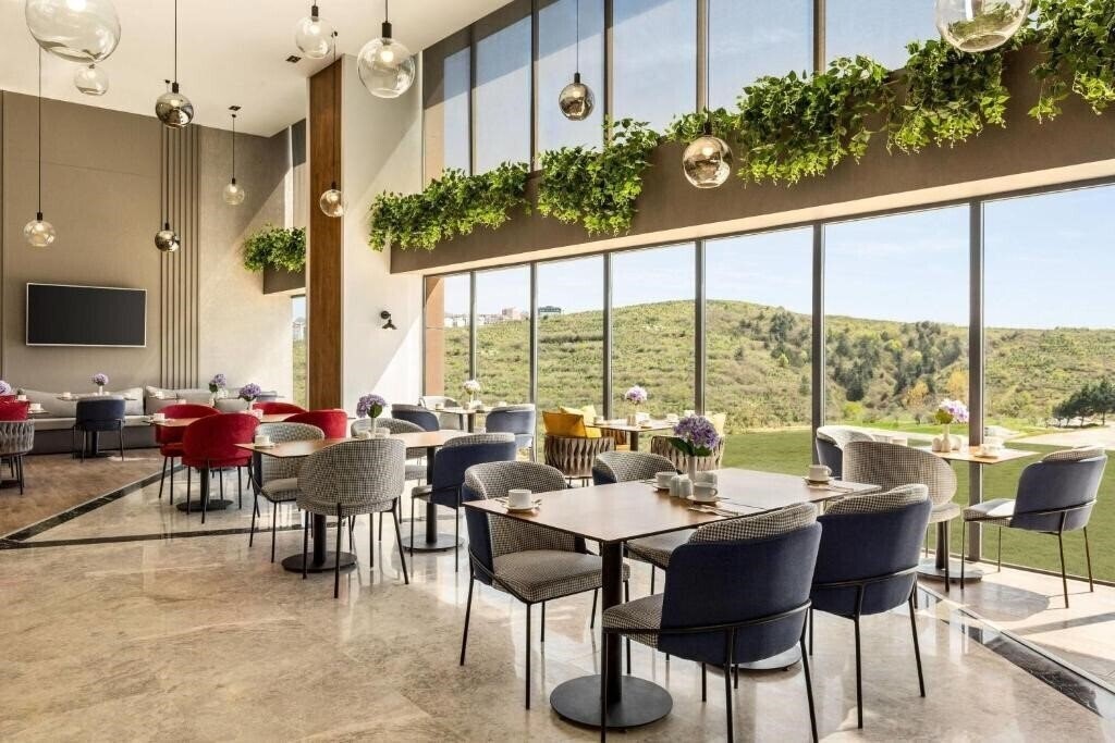 Фотографія Ramada Encore by Wyndham Istanbul Arnavutkoy 4*