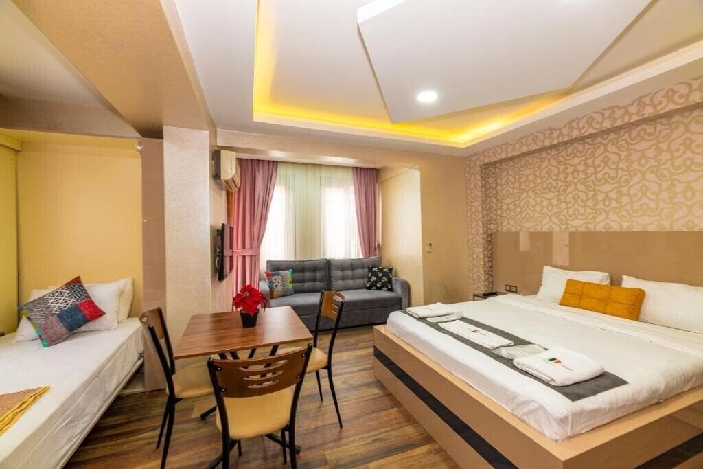 Фотографія Taxim Trend Suites 3*