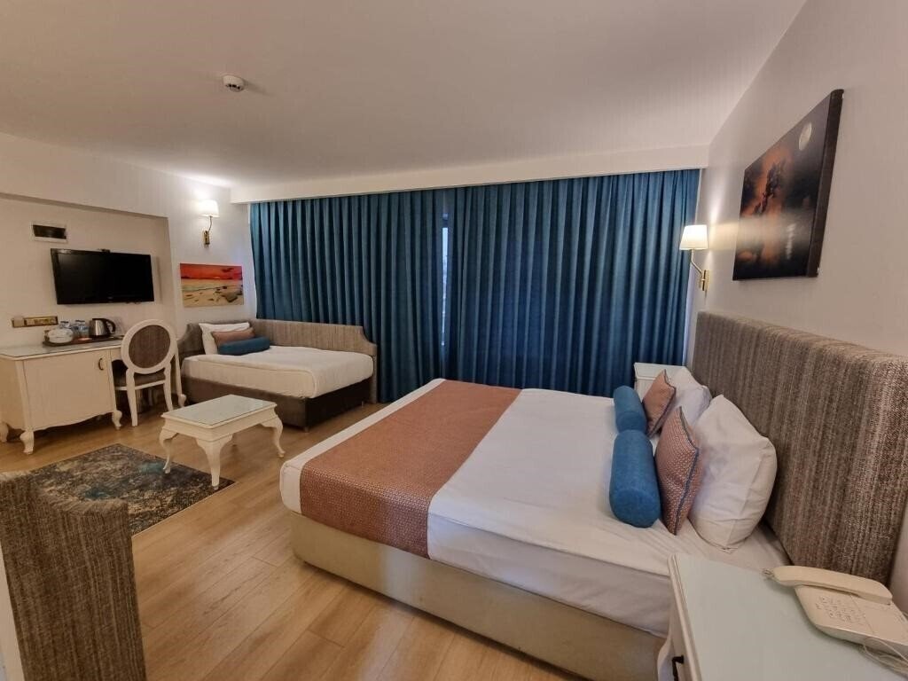 Фотографія Taximtown Hotel 4*