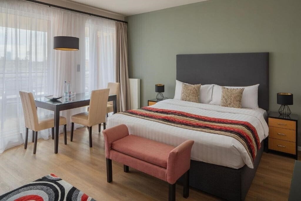 Готель Escala Hotel & Suites 4*