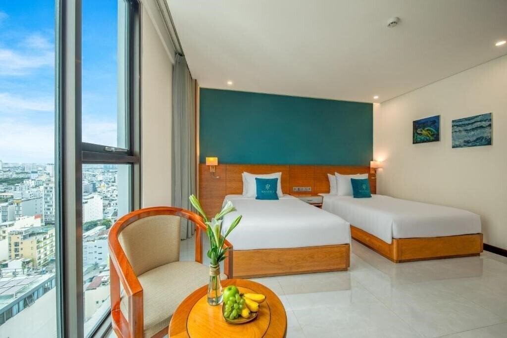 Фото Mandila Beach Hotel 4*