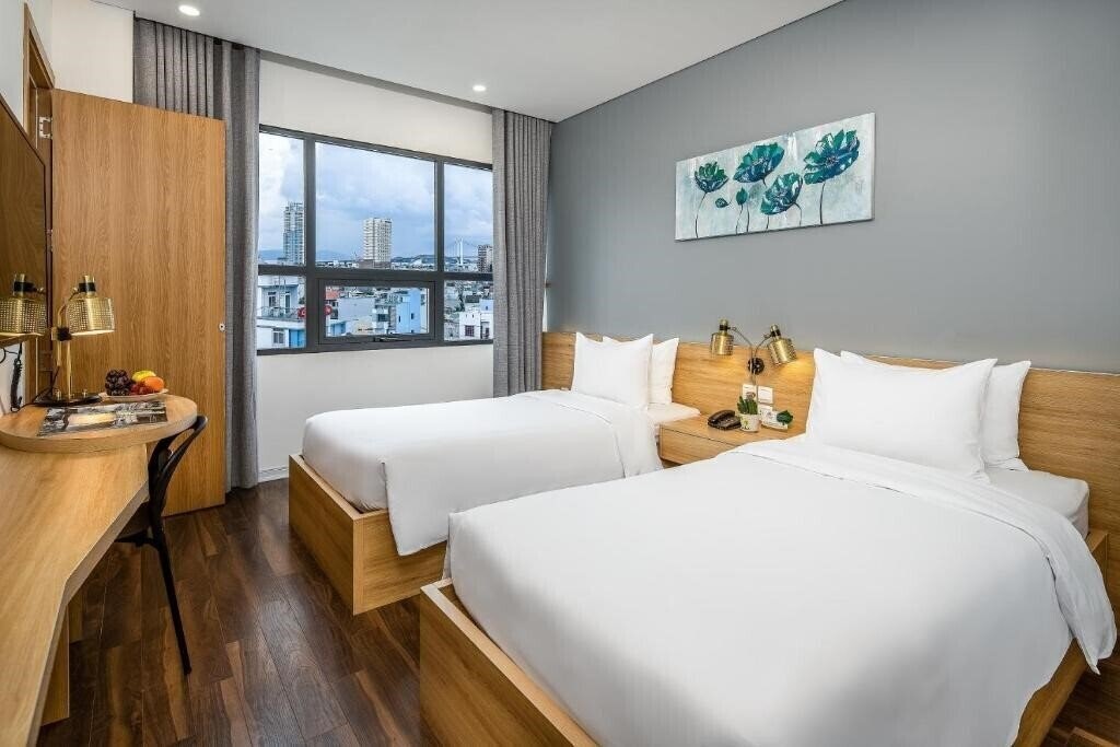Изображение Magnolia Hotel Danang 4*
