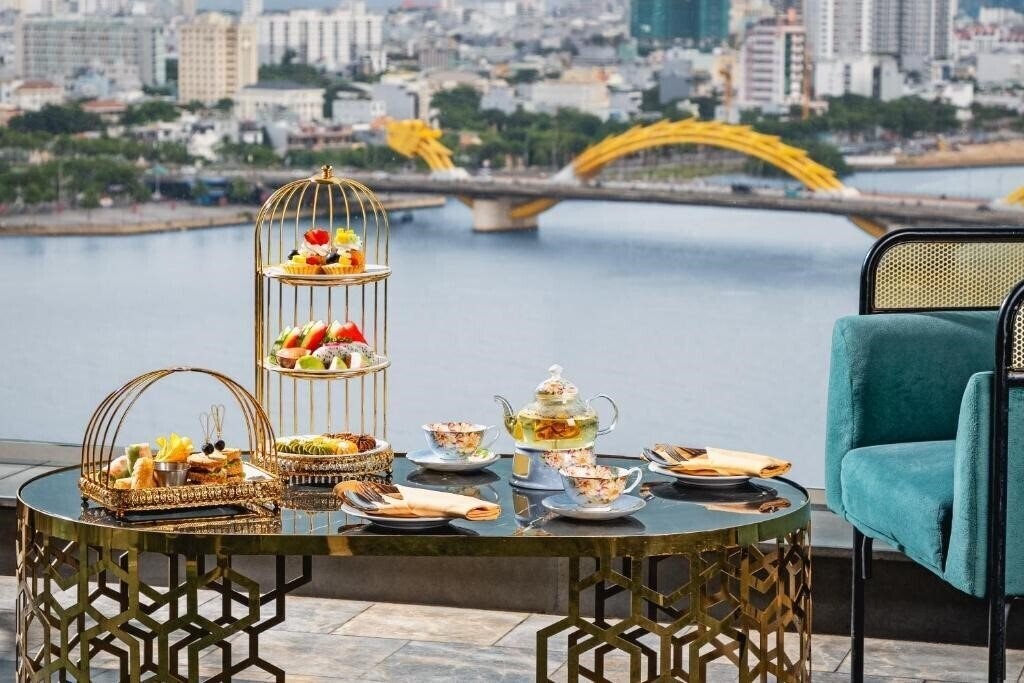 Фотографія Haian Riverfront Hotel 4*