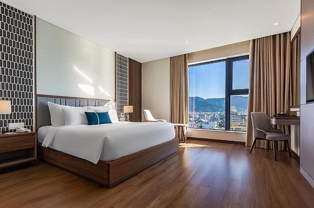 Фото Peninsula Hotel Danang 5*